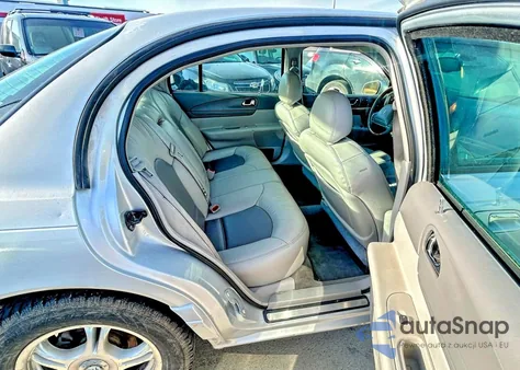 2001 Lincoln Continental z USA, uszkodzony, nr VIN 1LNHM97V71Y604107